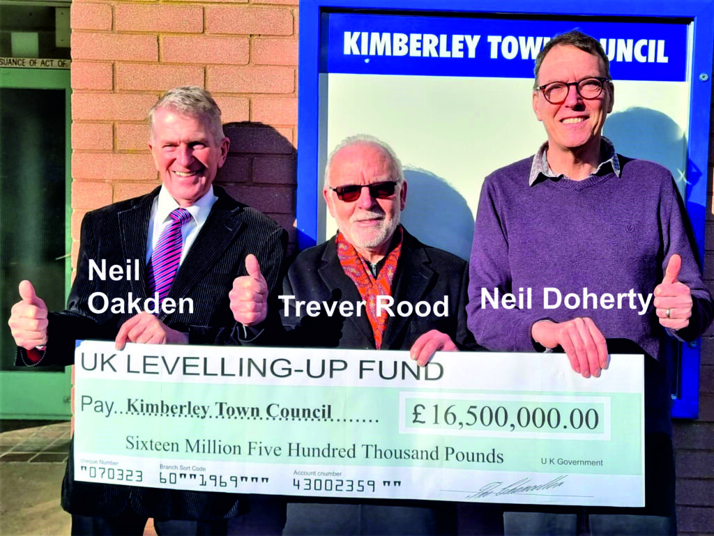Kimberley Town Councillors Neil Oakden, Trevor Rood, Neil Doherty with giant cheque for £16.5 million from levelling up fund